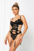 Back view of black lace lingerie set featuring adjustable straps and sheer mesh details